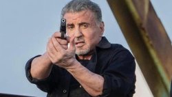 Sly Stallone firing pistol Meme Template