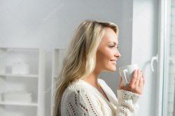 woman drinking coffee looking out window Meme Template