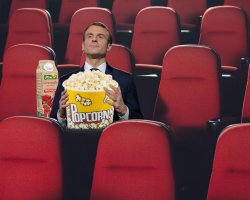 Macron in Theater with Pop-Corn Meme Template