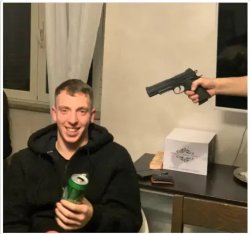 Happy man with a gun pointed at him Meme Template