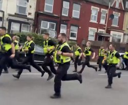 Police running to a gay bar Meme Template