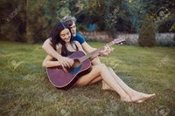 guy plays guitar with gurls hands Meme Template