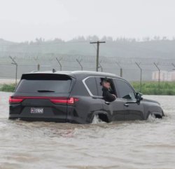 Kim stuck in flood Meme Template