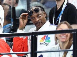 Snoop at Olympics looking down Meme Template