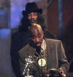 Snoop Dogg standing behind Tupac. Meme Template