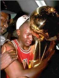 Jordan holding the NBA Trophy Meme Template