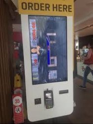 Doom running in a McDonald's kiosk Meme Template