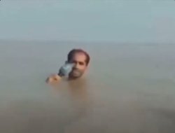 Reporter in Water Meme Template