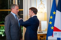 Bob Iger being decorated chevalier de la legion d’honneur Meme Template