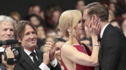 Kidman kissing Skarsgard while her husband cheers for them Meme Template