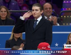 Barron Trump with hand to ear Meme Template