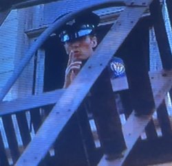 Shushing cop Meme Template