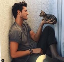 man with cat in hand Meme Template