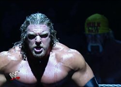 Hulk Hogan stares at Triple H Meme Template