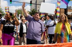 Gov Pritzker gets photobombed at Pride Meme Template