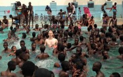 white guy in pool with blacks Meme Template