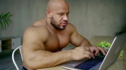 Strong man using laptop Meme Template