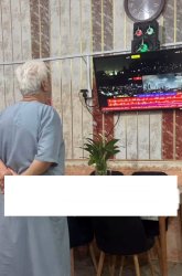Arab dad watching tv news Meme Template