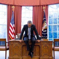 Obama sitting on desk Meme Template