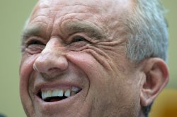 RFK Jr smiling while peddling junk science and killing children. Meme Template