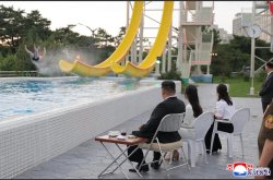 Kim Jong Un Waterslide Meme Template