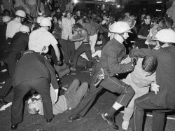 Riot police beating crowd Meme Template