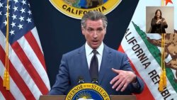 Gavin Newsom at podium Meme Template