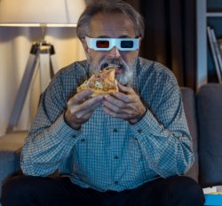 Man eating pizza with 3d glasses Meme Template