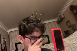 Kid Holding Flip Phone Crying Meme Template