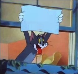 Tom holding board Meme Template