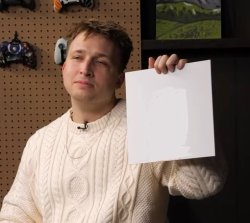 Shayne holds up painting Meme Template