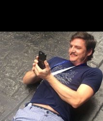 pedro pascal smiling at phone black Meme Template