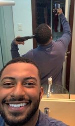 Guy in front of mirror with gun Meme Template