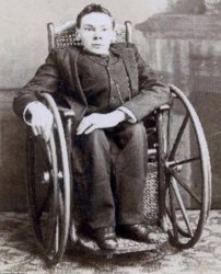 Vintage picture of man in wheelchair crippled Meme Template
