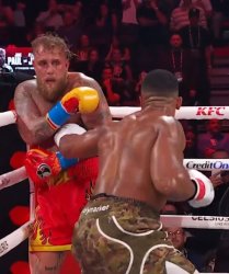 Jake Paul getting beat up by Anthony Joshua Meme Template