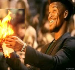 Jimmy Butler happily burns the paper Meme Template