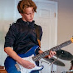 August playing guitar Meme Template