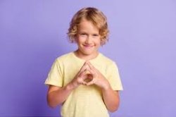 Kid Smiling Mischievously Meme Template