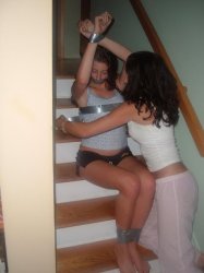 Person tying up another Meme Template