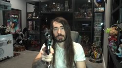 Moistcritikal pointing a gun at the camera Meme Template