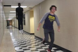 boy running from levitating guy Meme Template