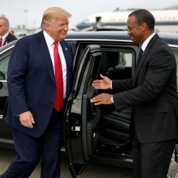 Trump getting into a limousine. Tiger Woods is in a black suit a Meme Template