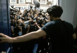 Dude surrounded by cameras Meme Template