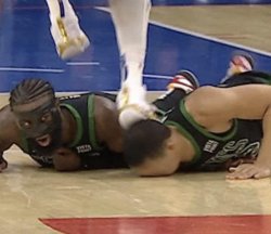 Man stepping on man's head on basketball court Meme Template