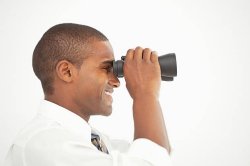 man looking through lunette smiling Meme Template