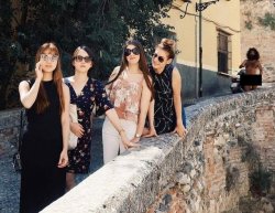 4 girls taking a photo while a naked guy approaches from afar Meme Template
