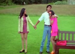 Shah Rukh hugging Kajol while holding one hand of Rani Mukerji Meme Template