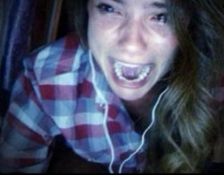 Girl crying with headphones Meme Template