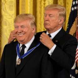 Trump, obsessed by medals, gives himself one for no reason. Meme Template