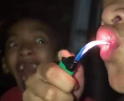 Man eating fire while friend is screaming Meme Template